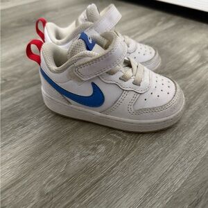 Nike Kids White Sneakers with Blue Swoosh